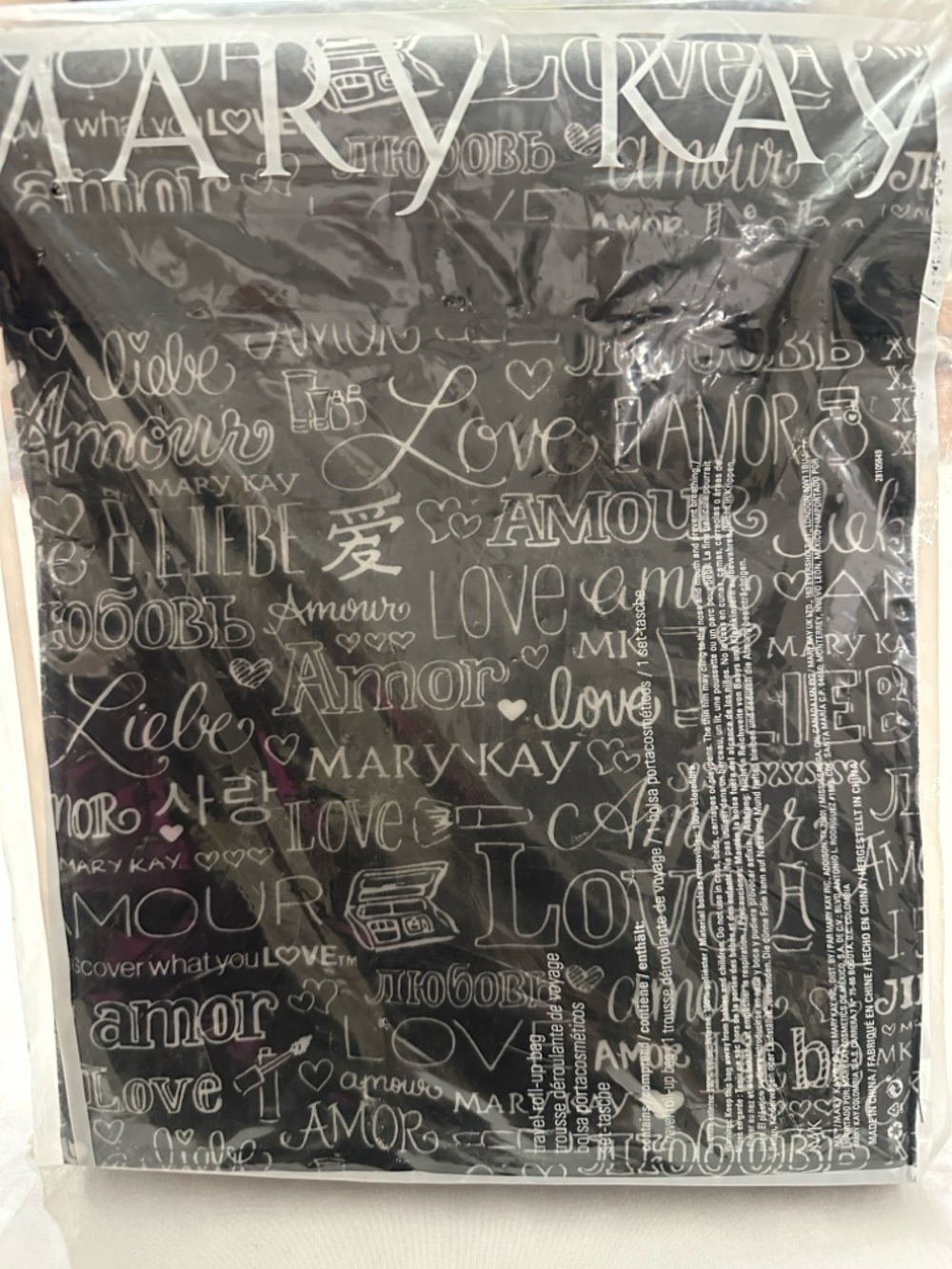 Mary Kay Black Cosmetic Pouch with White Script Love/Amor Print
